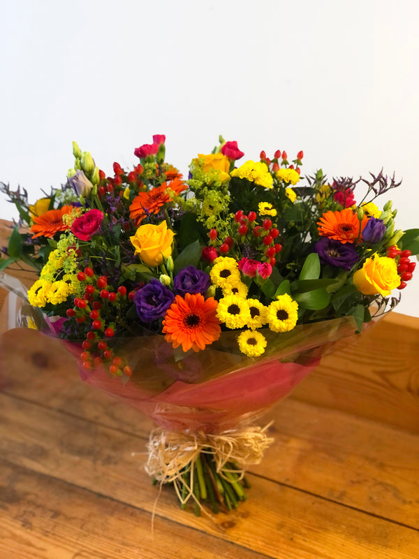 Manager Danielle with a Beautiful Bright Bouquet.