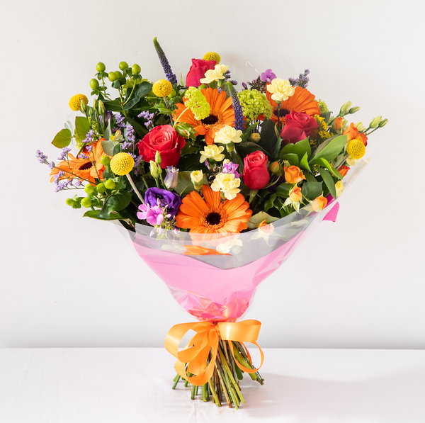 Emily Hand-Tied, Emily Aqua Pack - A colourful, vibrant and bold bouquet with Gerbera’s, Santini and Hypericum Berries. Hand-tied, same day delivery in Bournemouth.
