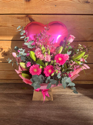Bright Pink heart balloon with flowers 