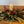 Load image into Gallery viewer, Traditional Christmas Table Decoration with a Candle. Festive foliage and flower arrangement. Same day delivery in Bournemouth.
