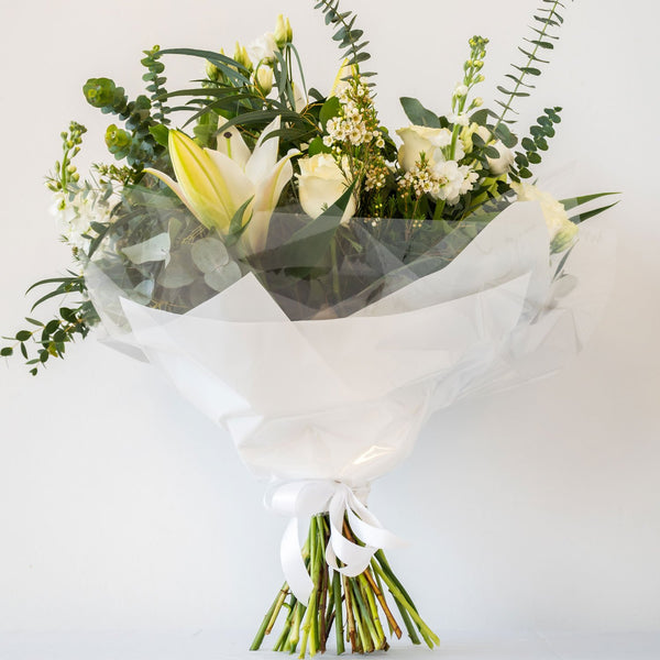 Danielle Hand-Tied - A classic, stylish and sophisticated natural white bouquet with greenery and eucalyptus hand-tied, for next day delivery in Bournemouth.