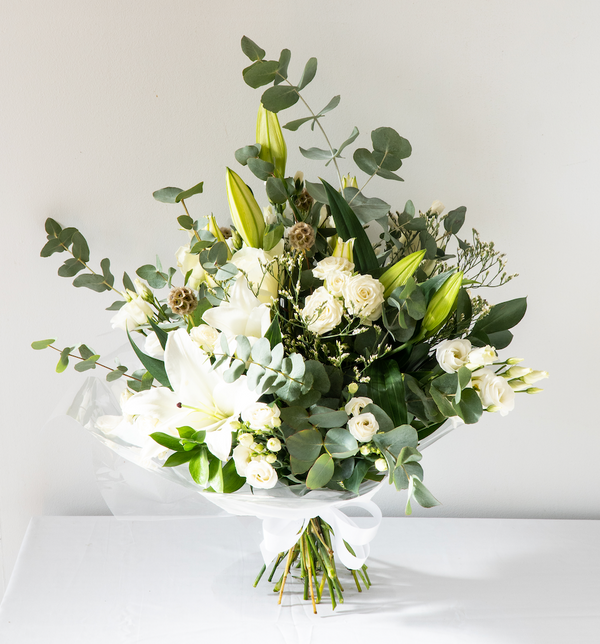 Danielle Hand-Tied - A classic, stylish and sophisticated natural white bouquet with greenery and eucalyptus hand-tied, for next day delivery in Bournemouth.