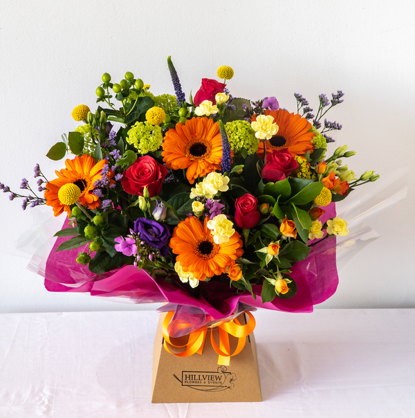 Emily Aqua Pack - A colourful, vibrant and bold bouquet with Gerbera’s, Santini and Hypericum Berries. Aqua Pack for Freshness, same day delivery in Bournemouth.