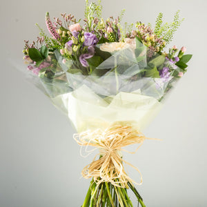 Sophie Hand-tied - elegant, calm and relaxing pastel bouquet with Freesia, handpicked Delphinium and soft foliage. Hand-tied for same day delivery in Bournemouth.